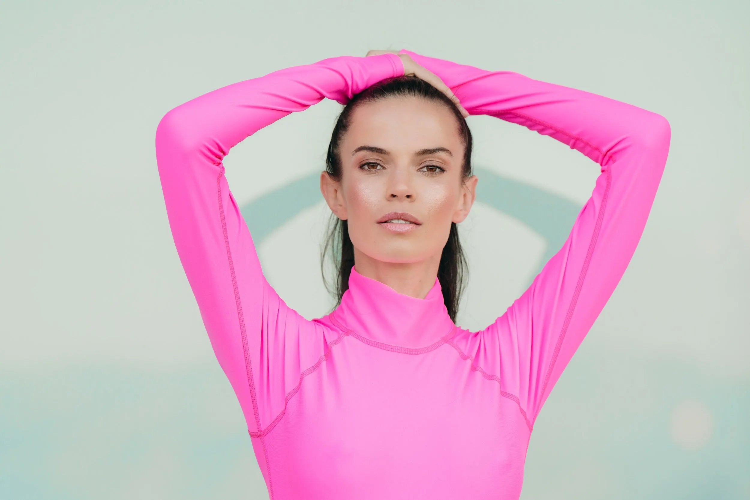 WOMEN'S UPF 50  SUN PROTECTIVE LONG SLEEVE "SHORTY" SWIMSUIT - NEON PINK